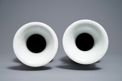 A pair of Chinese famille rose two-sided design vases, 19/20th C.