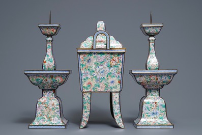 A Chinese millefleurs Canton enamel three-piece altar garniture, Qianlong