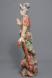 A tall Chinese painted and carved wood figure of Guanyin, 18/19th C.