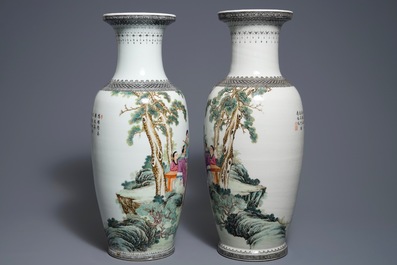 A pair of Chinese famille rose vases with figures in a garden, Qianlong mark, 20th C.