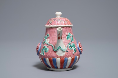 A Chinese famille rose relief-moulded teapot and cover, Yongzheng