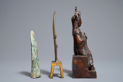 Two Chinese bronze figures and a bronze axe fragment, poss. Han and Ming