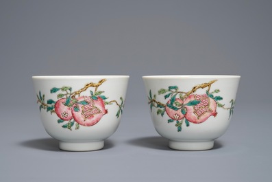 A pair of Chinese famille rose pomegranate cups, Daoguang mark, 19/20th C.