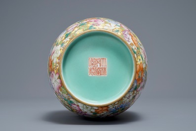 A Chinese famille rose millefleurs vase, Qianlong mark, 20th C.