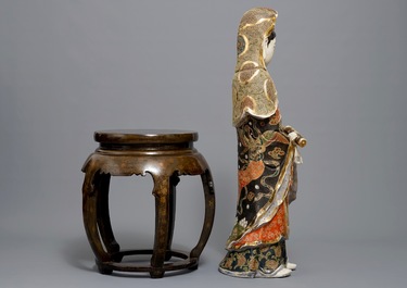 A large Japanese Satsuma figure of Kannon on laquered wooden stand, Meiji, 19/20th C.