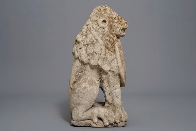A large stone model of a lion with shield, probably Flemish, 17th C.