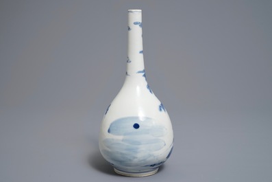 A Chinese blue and white bottle vase with a fisherman, 19th C.