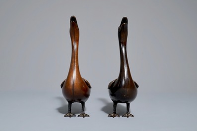 A pair of Chinese bronze duck-shaped incense burners and covers, 18th C.