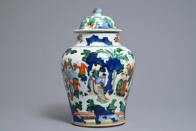 A Chinese wucai baluster vase and cover with playing boys, Transitional period