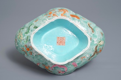 A Chinese imperial quatrefoil 'dragons' dish on foot, Jiaqing mark and of the period