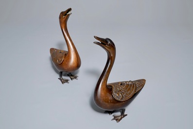 A pair of Chinese bronze duck-shaped incense burners and covers, 18th C.