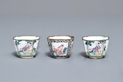 Four Chinese Canton enamel saucers and three cups, Qianlong