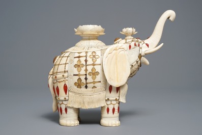 A Chinese hardstone-inlaid ivory model of an elephant, late 19th C.