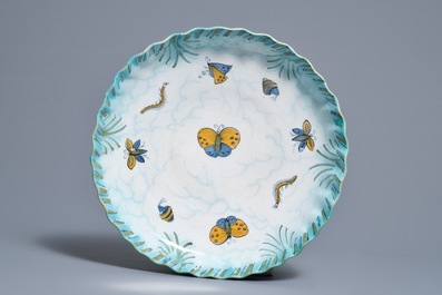 A Brussels faience tureen and cover on stand with butterflies and caterpillars, 18th C.