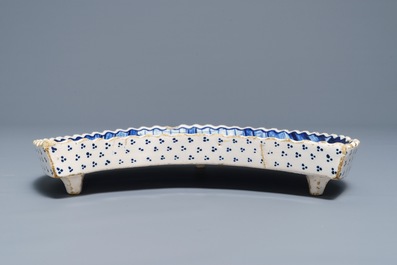 A Frisian blue and white demi lune tea scene tray, 19th C.