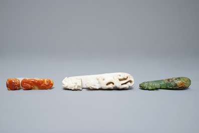 Three Chinese jade belt hooks, 19th C.