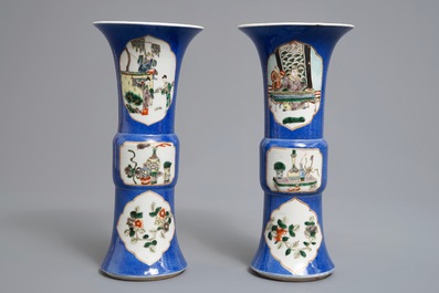 A pair of Chinese famille verte on powder blue ground gu vases, Kangxi mark, 19th C.