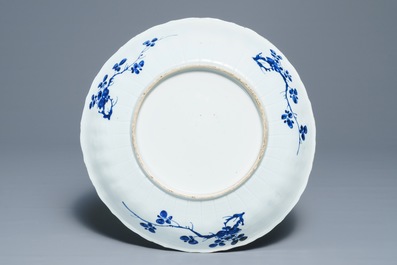 A Chinese blue and white 'flower basket' charger, Kangxi