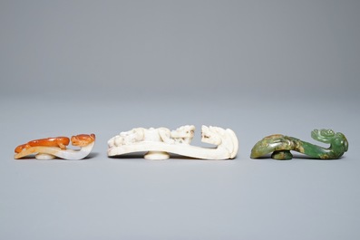 Three Chinese jade belt hooks, 19th C.