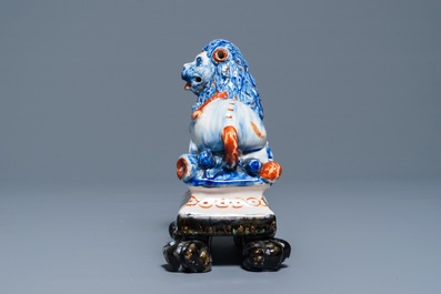 A polychrome Dutch Delft model of a lion, 19th C.