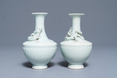 A pair of Chinese ru-style glazed vases with applied qilong, Yongle mark, 19th C.