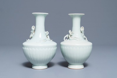 A pair of Chinese ru-style glazed vases with applied qilong, Yongle mark, 19th C.