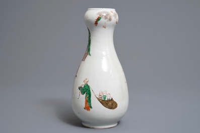 A Chinese famille verte pear-shaped bottle vase with Luohans, 19th C.