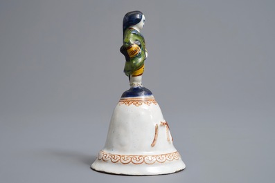 Une cloche de table en fa&iuml;ence polychrome de Delft, dat&eacute;e 1796