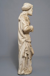 A carved stone figure of Saint Peter standing, prob. France, 16th C.