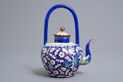 A Chinese Canton enamel teapot with floral design, 18/19th C.