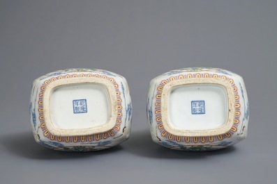 A pair of Chinese famille rose fanghu vases with cranes, Qianlong marks, 19/20th C.