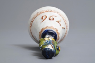 A polychrome Dutch Delft table bell with a nobleman, dated 1796