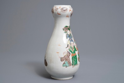 A Chinese famille verte pear-shaped bottle vase with Luohans, 19th C.