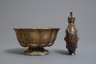 A gilt brass bowl and an inlaid silver flask, Tibet, 19/20th C.