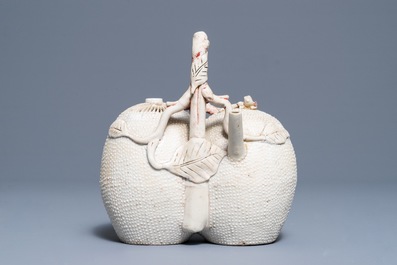 A Chinese biscuit 'conjoined peach' teapot and cover, Kangxi/Yongzheng