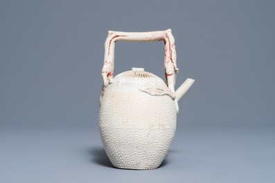 A Chinese biscuit 'conjoined peach' teapot and cover, Kangxi/Yongzheng