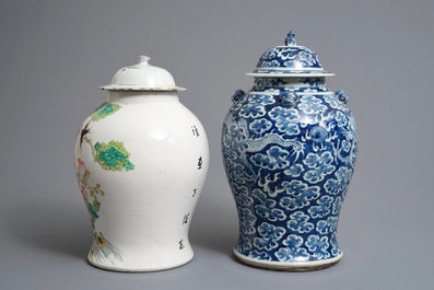 Two Chinese blue and white and famille rose vases and covers, 19/20th C.