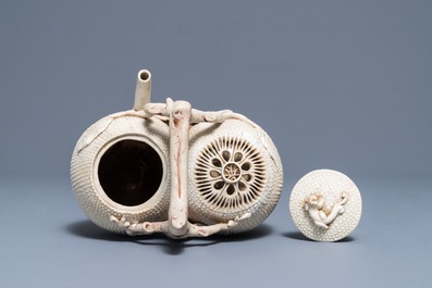 A Chinese biscuit 'conjoined peach' teapot and cover, Kangxi/Yongzheng