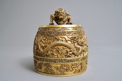 A Chinese gilt bronze bell in zitan suspension frame, Qianlong mark, 18/19th C.