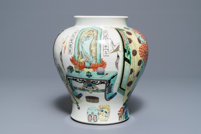 A Chinese famille verte vase with figures in a temple, Kangxi mark, 19th C.