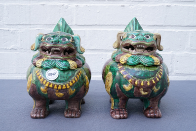 A pair of Chinese sancai Buddhist lion-shaped incense burners, 20th C.