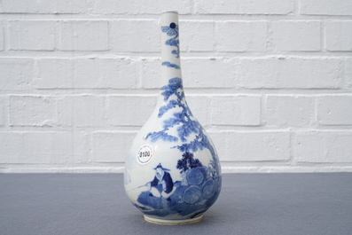 A Chinese blue and white bottle vase with a fisherman, 19th C.