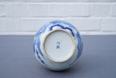 A Chinese blue and white bottle vase with a fisherman, 19th C.