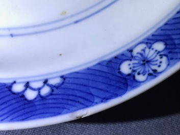 A pair of Chinese blue and white 'dragon' plates, Kangxi mark and of the period