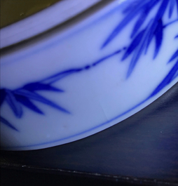 A Chinese blue and white cylindrical three-tier box, 19th C.