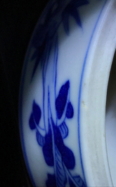 A Chinese blue and white cylindrical three-tier box, 19th C.