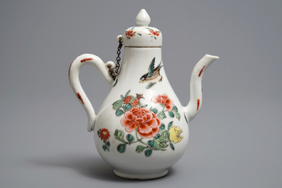 A Chinese famille rose jug and cover with birds and butterflies, Yongzheng mark and of the period