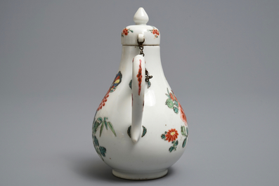 A Chinese famille rose jug and cover with birds and butterflies, Yongzheng mark and of the period