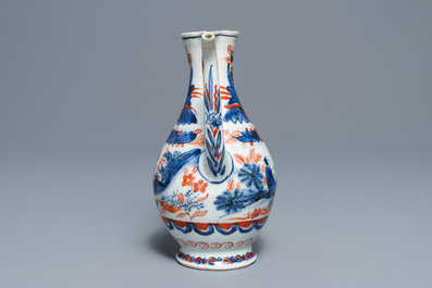 A clobbered Chinese blue and white ewer, Transitional period