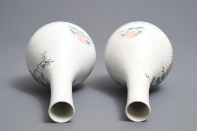 A pair of Chinese famille rose bottle vases with birds and flowers, Yongzheng